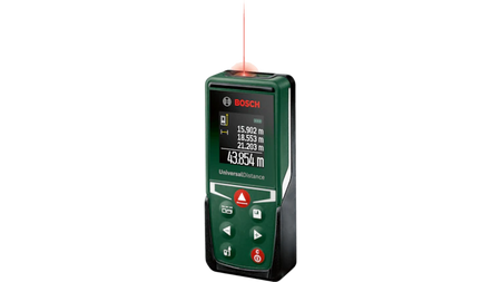 A Bosch laser level device in dark green and black, shown on a plain white background with its red laser beam illuminated above it.