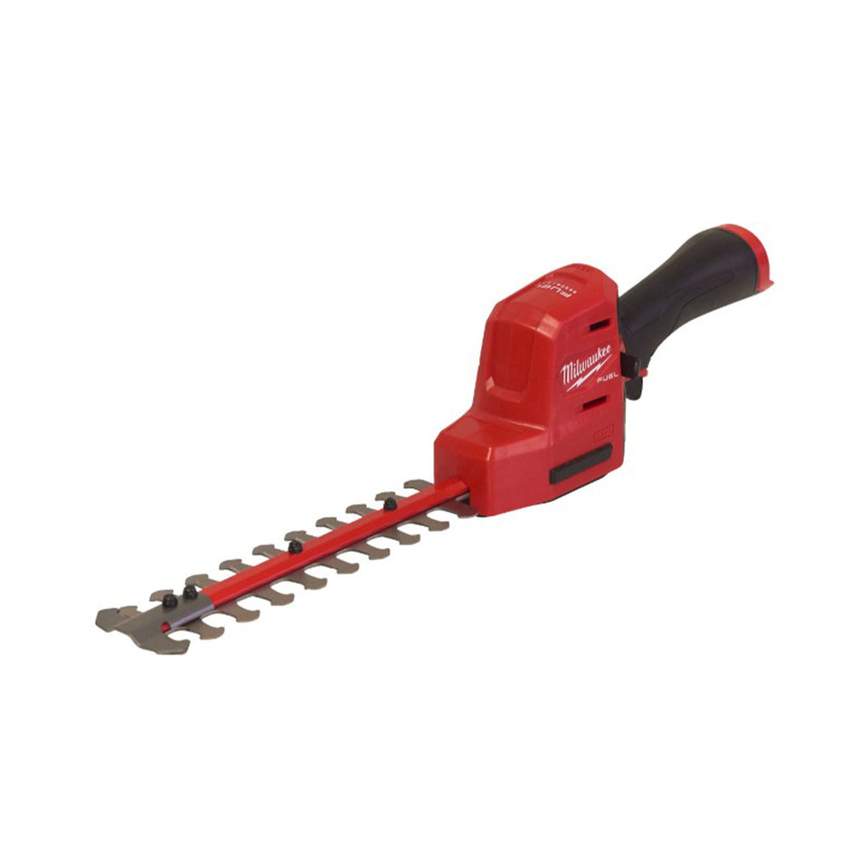 Red hedge trimmer with black handle on a white background