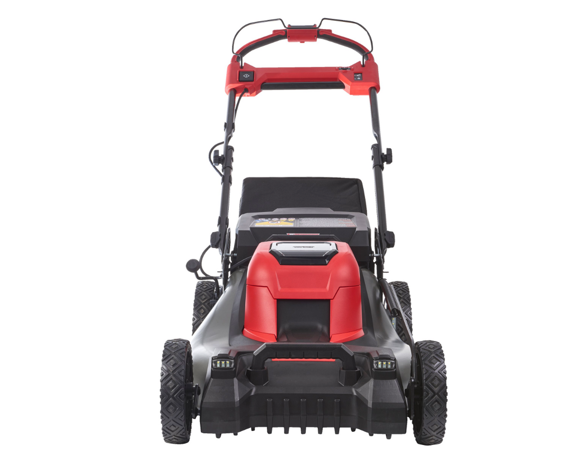 Red and black lawn mower on a white background