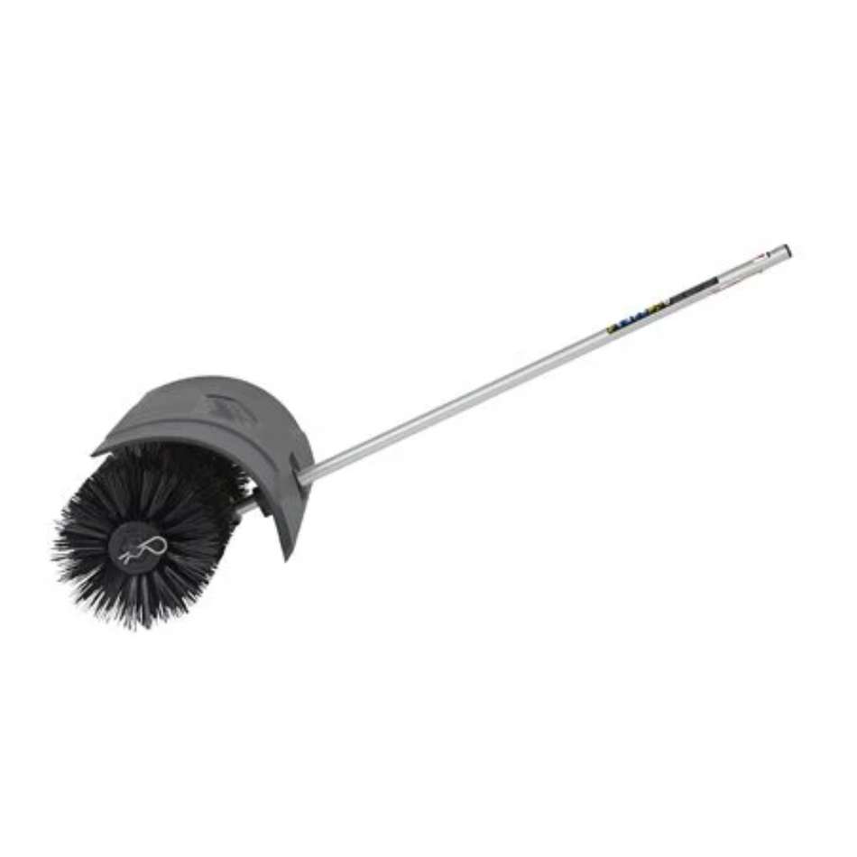 Cleaning brush with a long handle on a white background