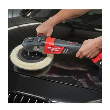 Person using a Milwaukee car polisher on a black car surface