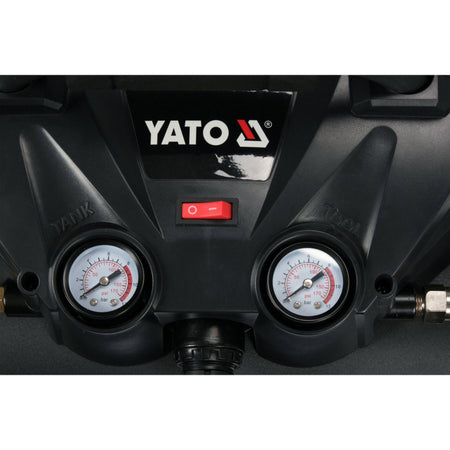 YATO branded air compressor with pressure gauges on a white background