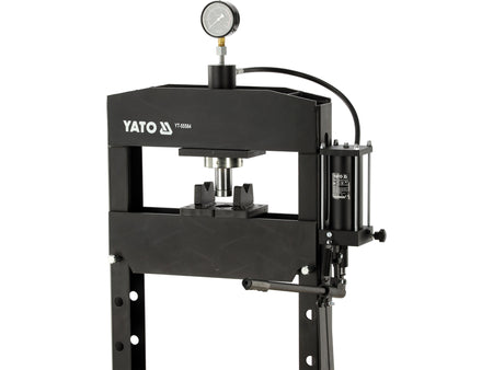 Black YATO hydraulic press on a white background