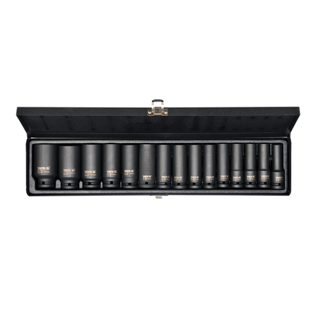 Set of black cylindrical containers with gold labels in a black case on a white background