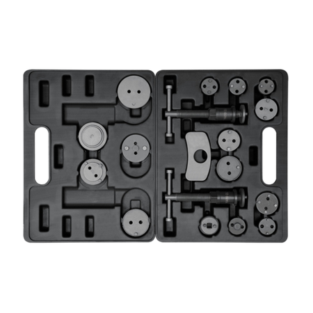 Set of mechanical components on a black tray with a white background