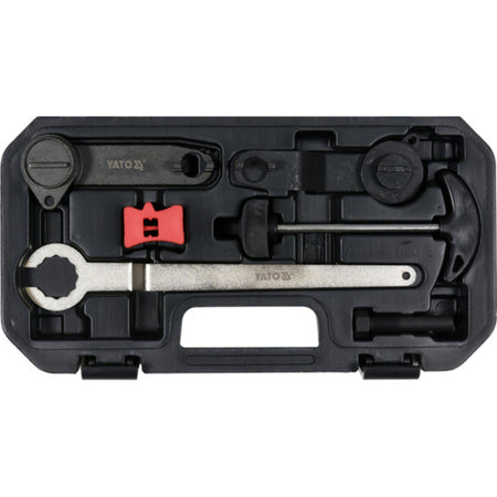 Set of tools in a black plastic case on a white background