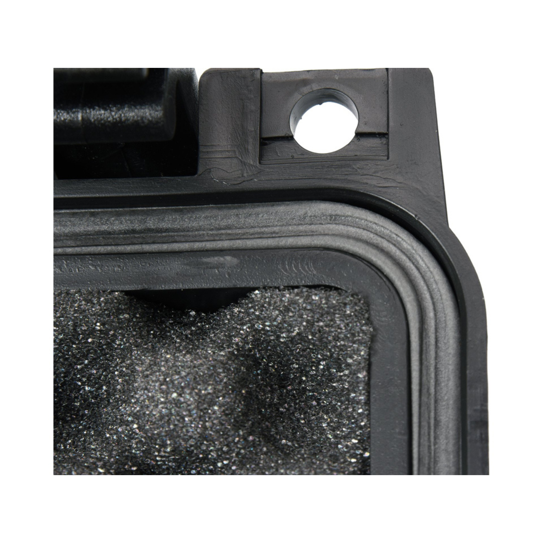 Close-up of a black rubber gasket with a white circle on a white background