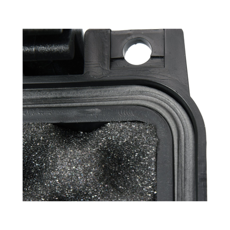 Close-up of a black rubber gasket with a white circle on a white background