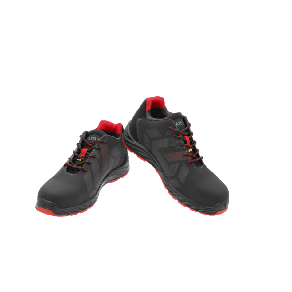 Black safety shoes with red accents on a white background