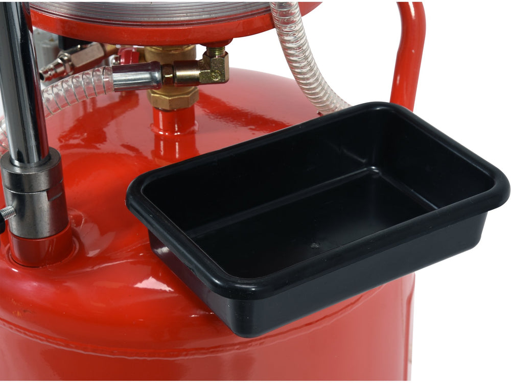 Red oil filter press with a black oil collection pan on a white background