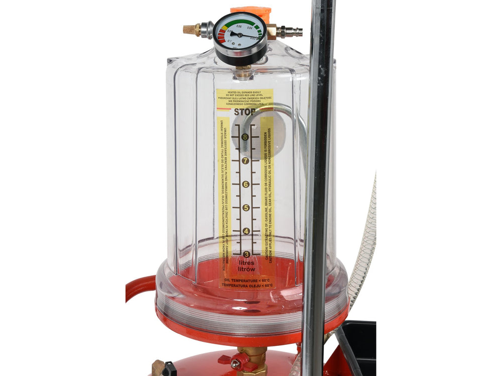 Clear pressure gauge with red base on a white background