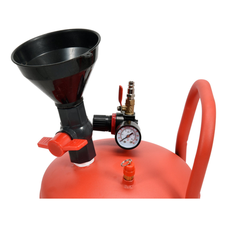 Red pressure cooker with black funnel and gauge on a white background