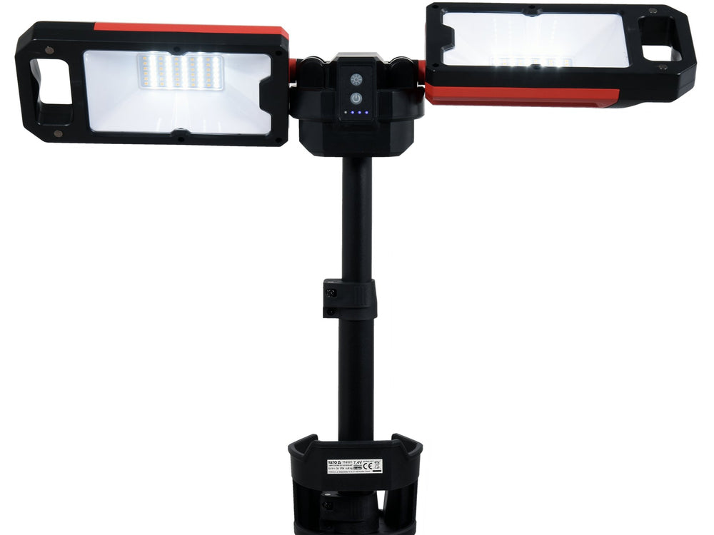 Black and red adjustable stand with two rectangular light panels on a white background