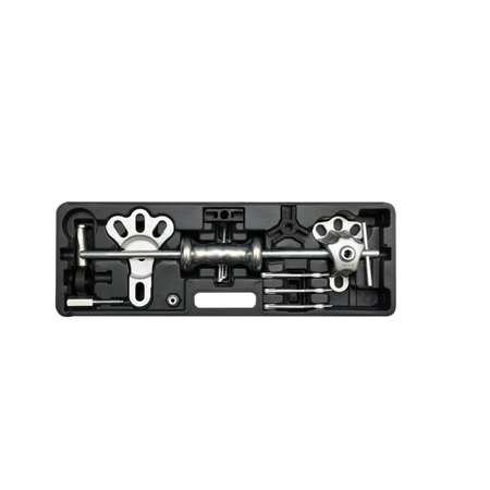 Set of tools in a black plastic holder on a white background