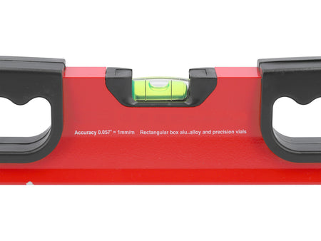 Red level tool with black handles on a white background