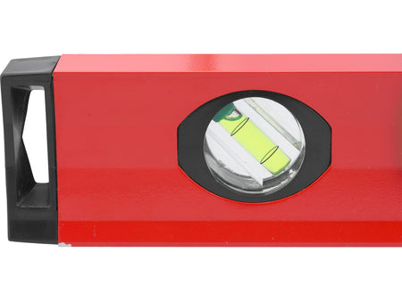 Red level tool with a black handle on a white background