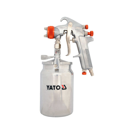 Yato spray gun with tank on a white background