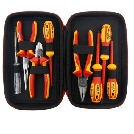 Set of tools including pliers and screwdrivers in a black case on a white background