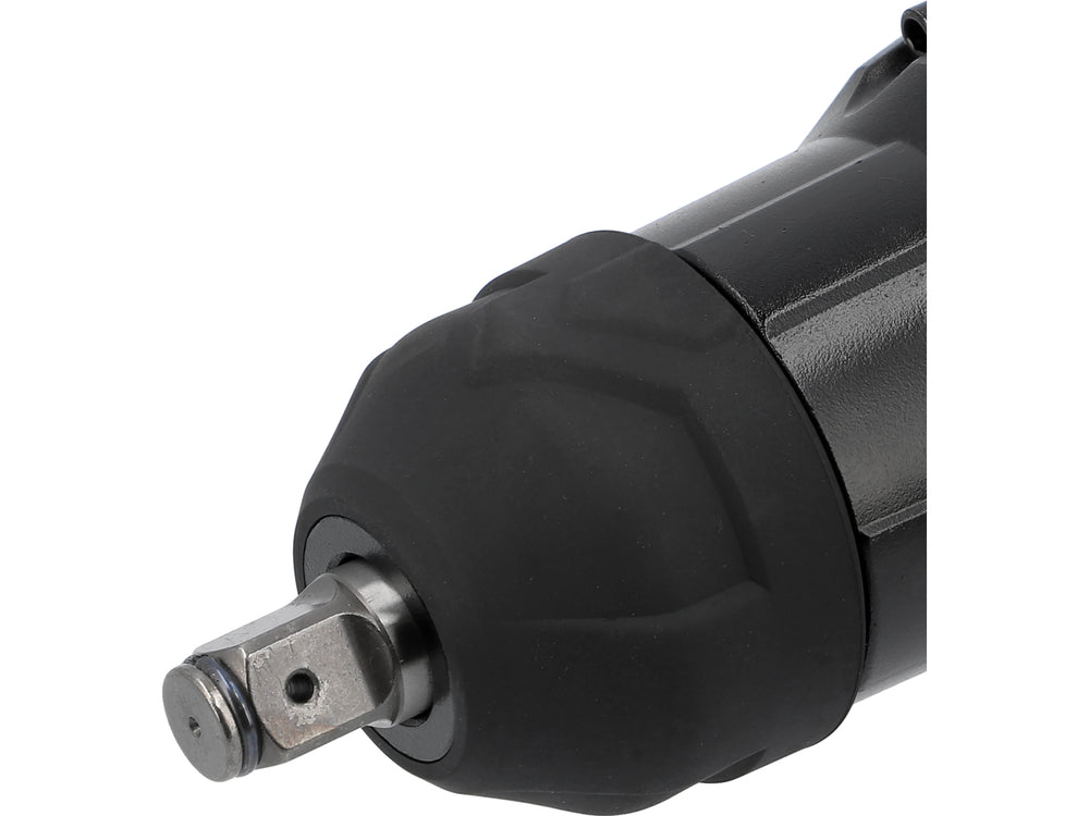 Close-up of a black impact wrench on a white background