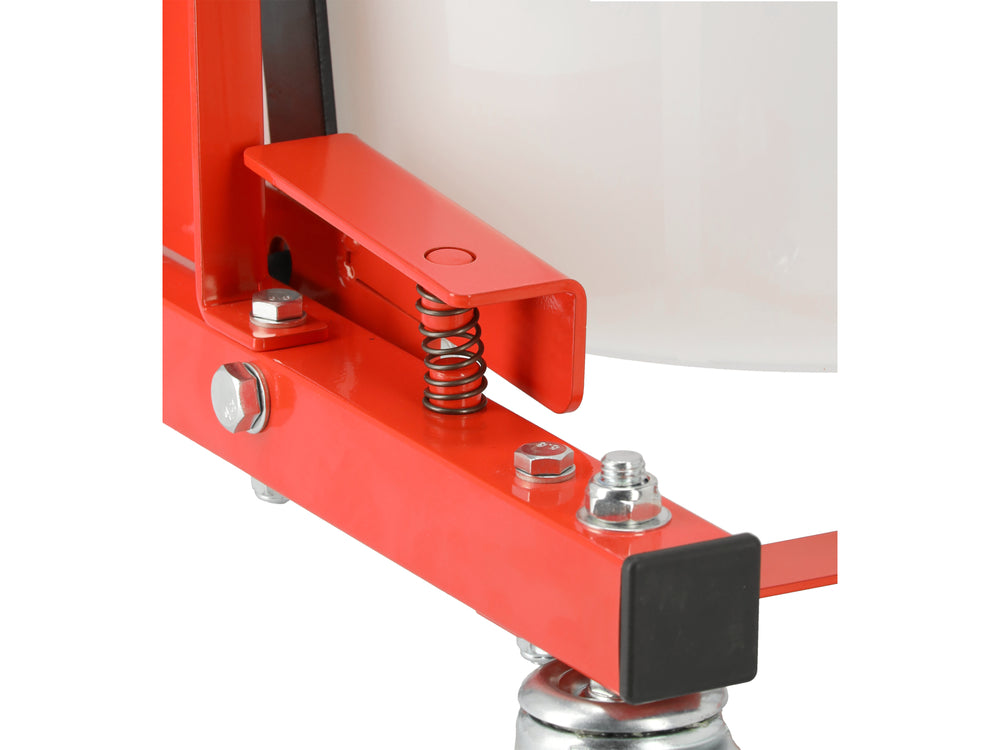 Red metal clamp with springs and screws on a white background