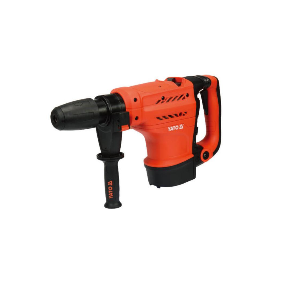 Orange and black rotary hammer drill on a white background