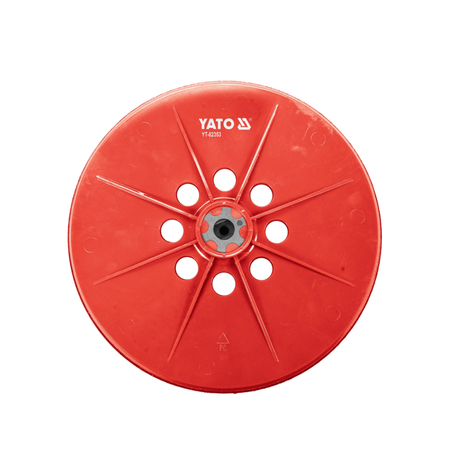 A red circular plastic spool or reel with radial spokes and multiple circular cutouts, featuring the white YATO brand logo and model number TY-2030 near the top center.