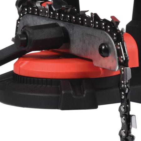 Close-up of a chainsaw with a red handle on a white background