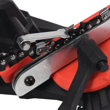 Close-up of a chainsaw chain and blade on a white background